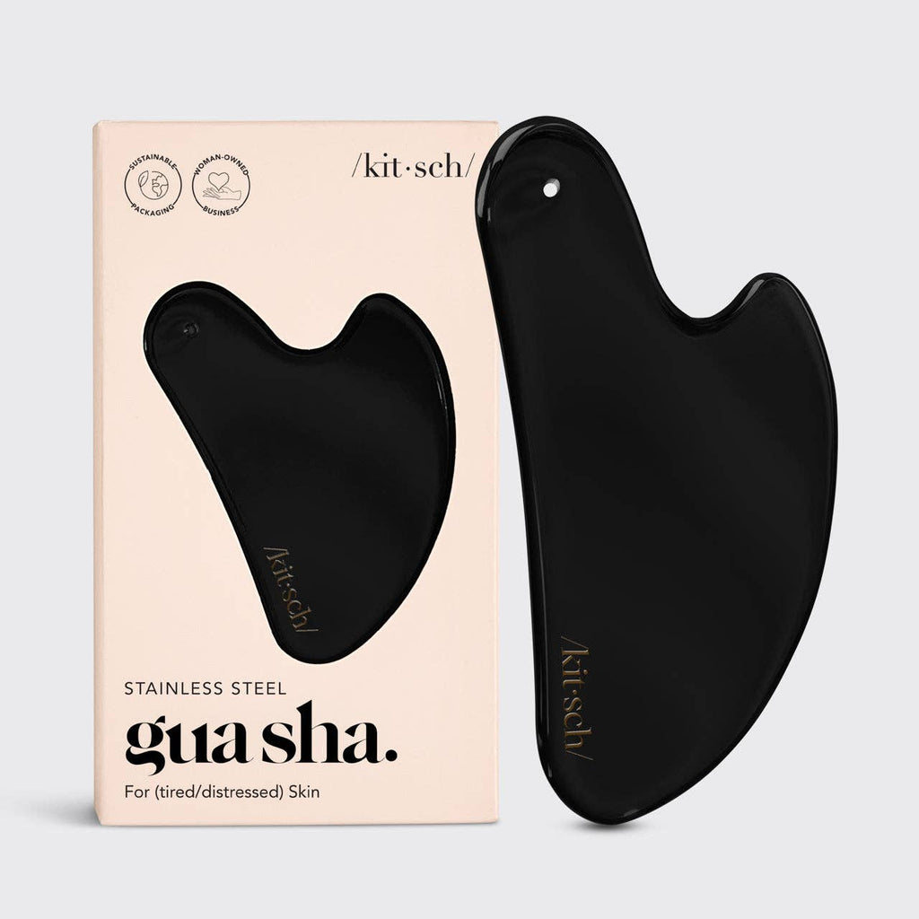 KITSCH stainless steel Gua Sha tool in matte black, designed for facial massage and skincare.