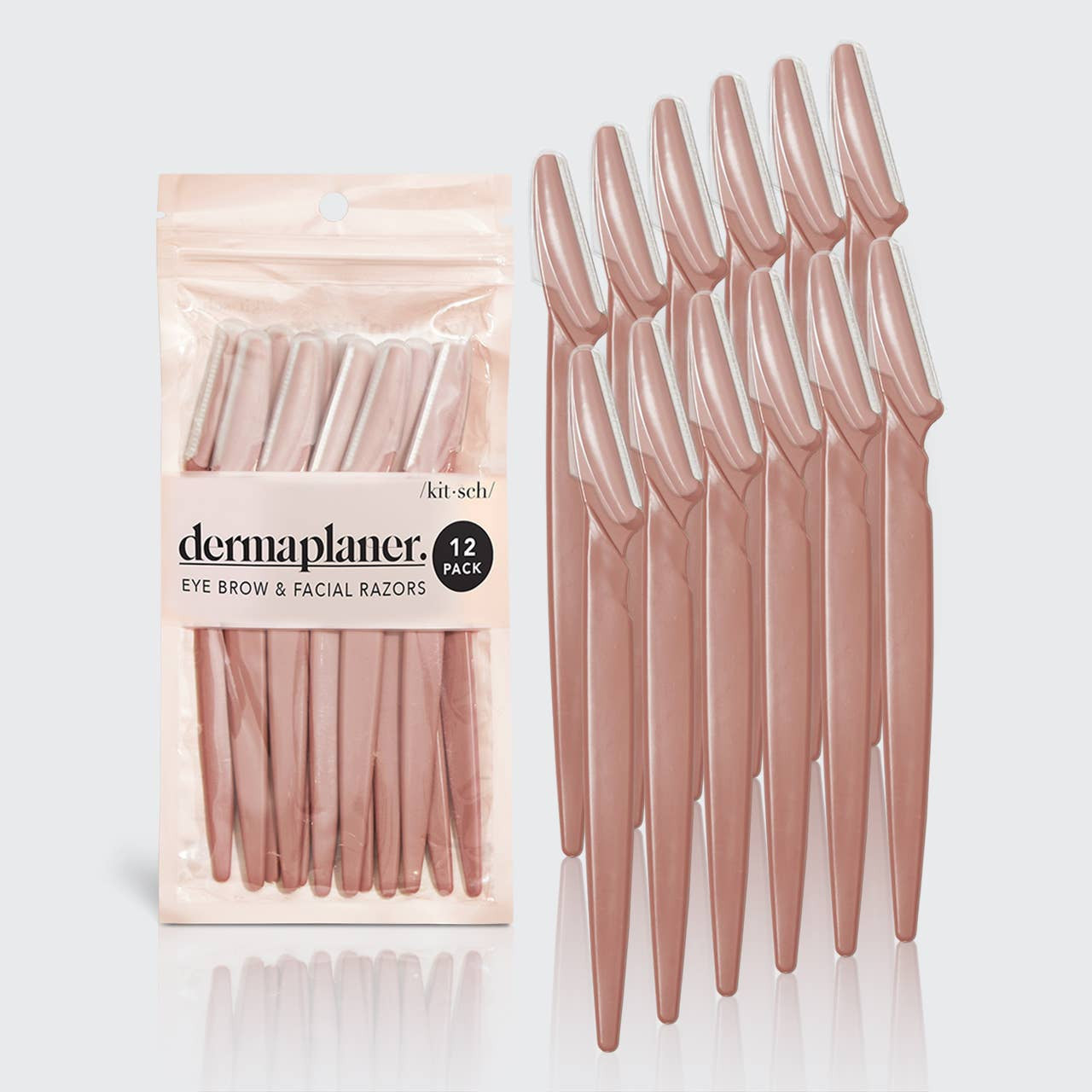 KITSCH eco-friendly dermaplaner 12-pack in terracotta color, featuring sleek disposable blades for facial hair removal and exfoliation.