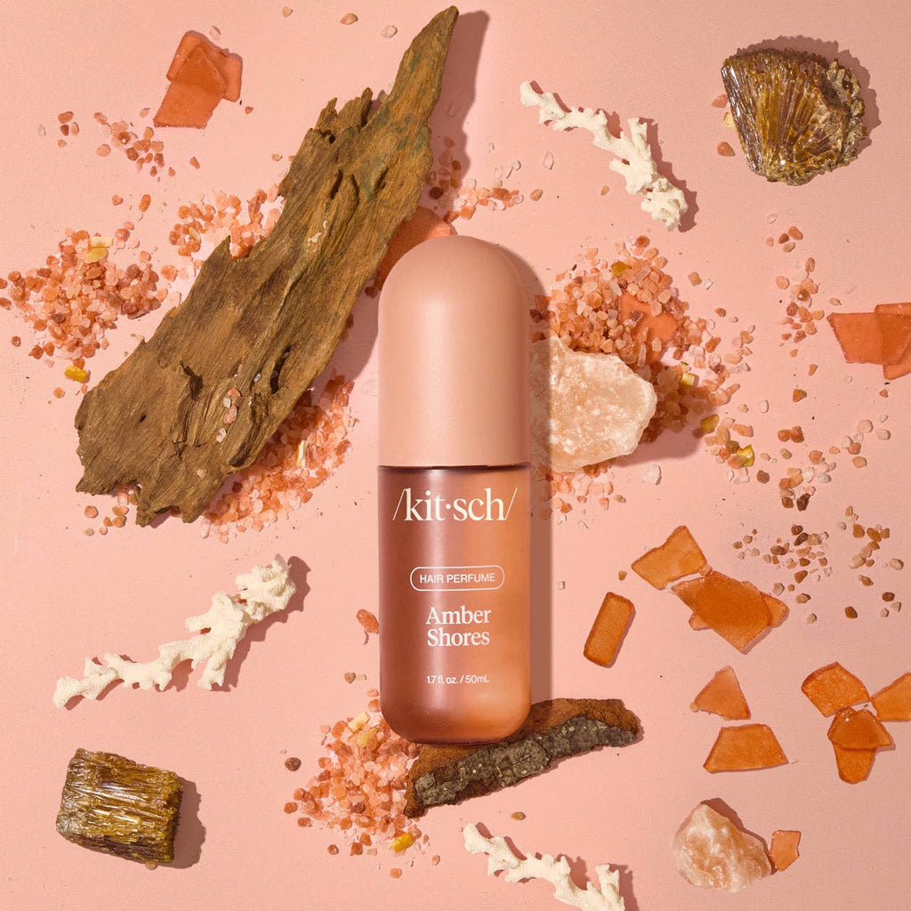 KITSCH Amber Shores Hair Perfume bottle with elegant label, showcasing the luxurious packaging and amber-colored liquid inside.