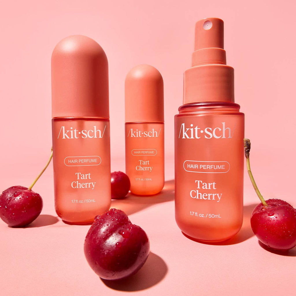 KITSCH Tart Cherry Hair Perfume bottle with cherry blossom design, showcasing the product's packaging and elegant branding.