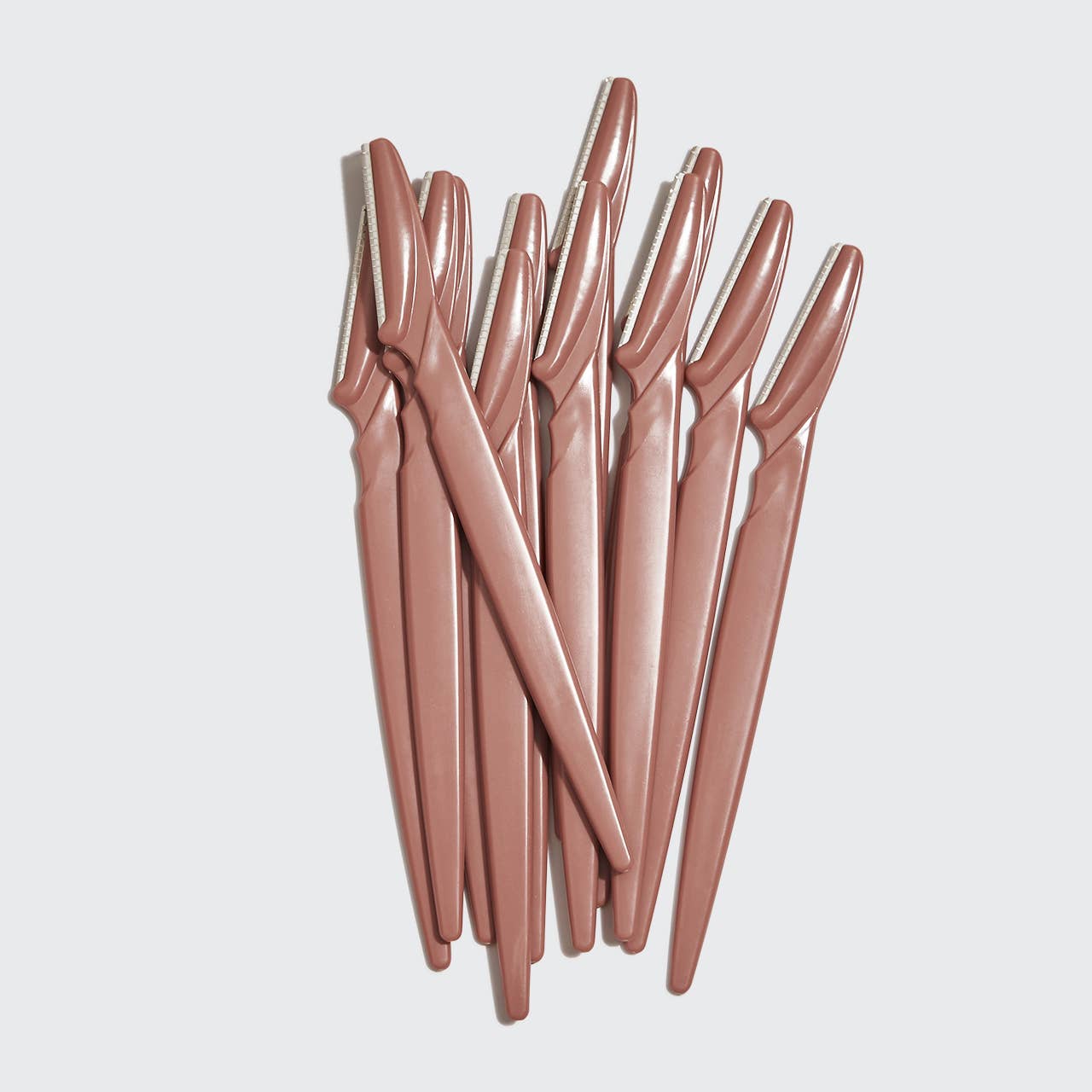 KITSCH eco-friendly dermaplaner 12-pack in terracotta, showcasing the textured exfoliating tools for smooth skin.