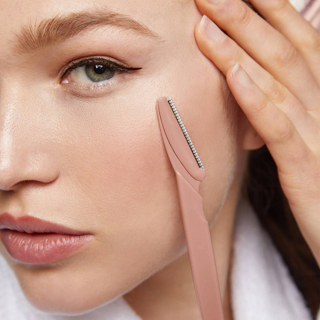 KITSCH eco-friendly dermaplaner 12-pack with terracotta-colored blades for gentle facial exfoliation and skin smoothing.