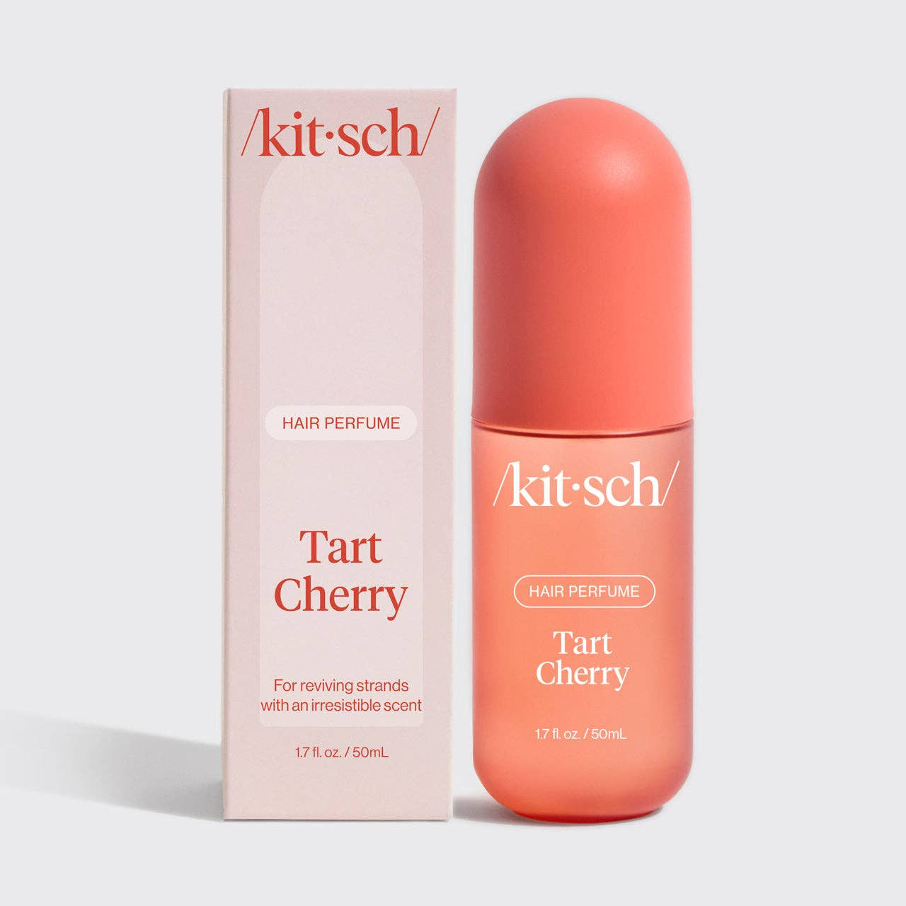 KITSCH Tart Cherry Hair Perfume bottle with cherry blossom design, showcasing the luxurious hair fragrance in a sleek, elegant container.