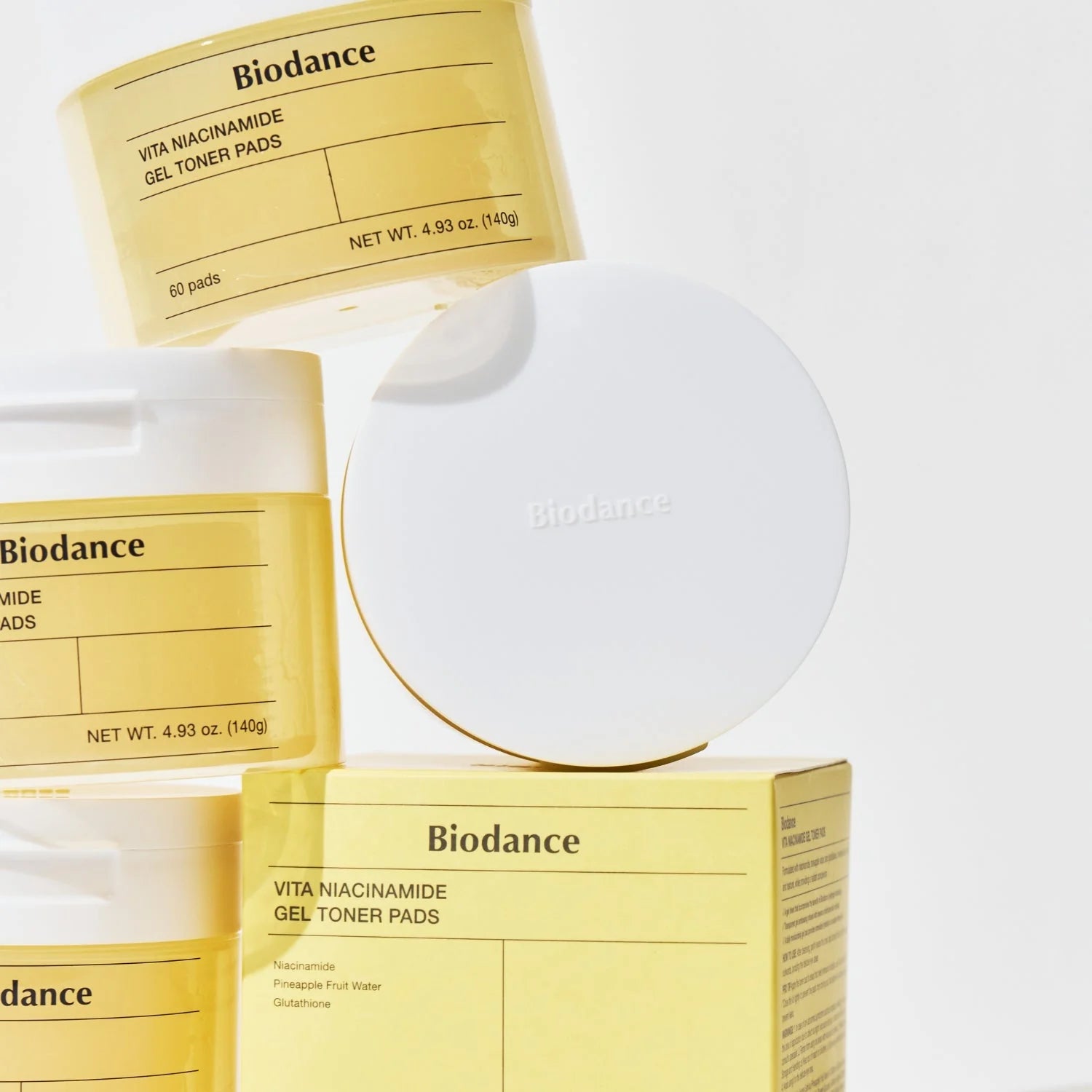 Biodance Vita Niacinamide Gel Toner Pads in a container, showing 60 pre-soaked skincare pads for facial use