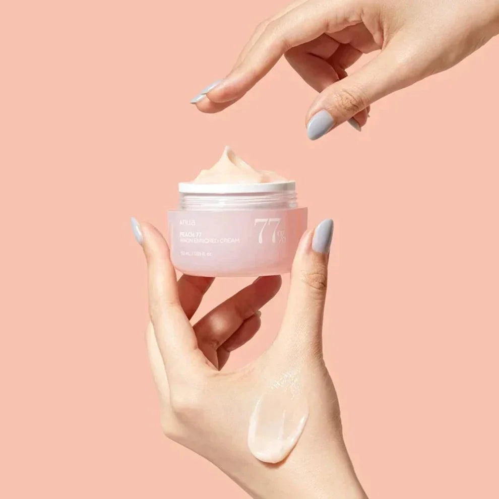 Anua Peach 77 Niacin Enriched Cream 50ml jar with peach-colored packaging and label, showcasing a skincare product.