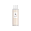 Beauty of Joseon Glow Replenishing Rice Milk 150ml bottle with white and gold packaging and a pump dispenser, close-up view