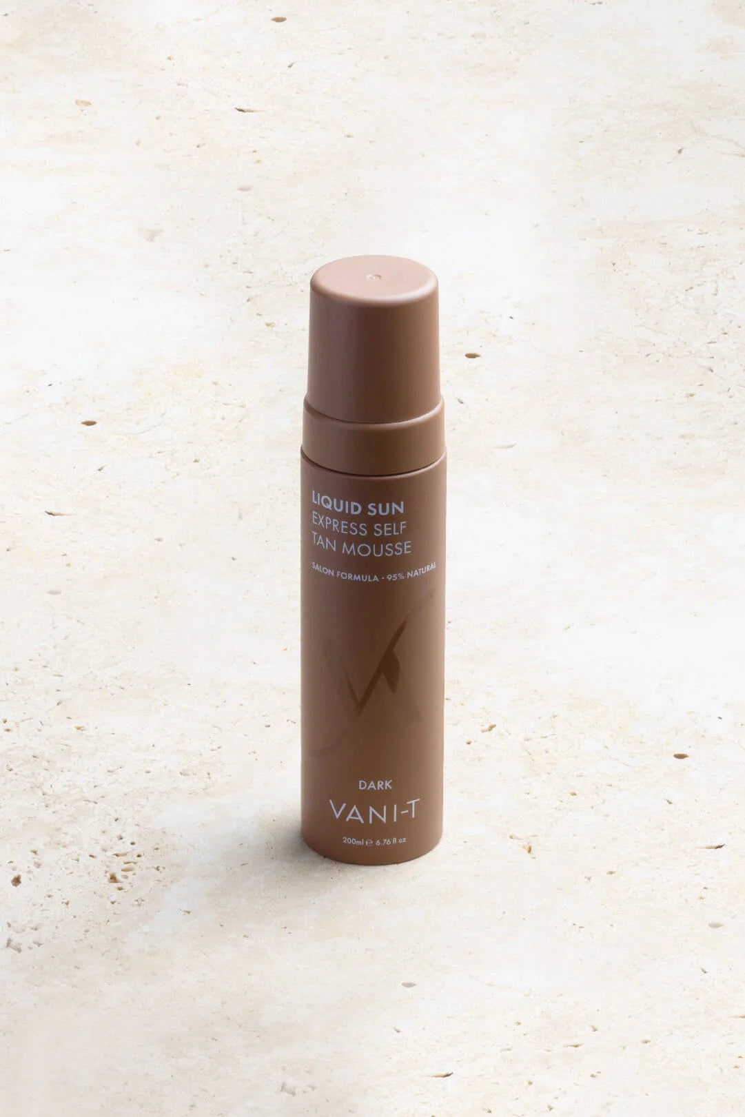 VANI-T Liquid Sun Express Self Tan Mousse in dark shade, showing the bottle with a smooth, foamy texture on a neutral background.