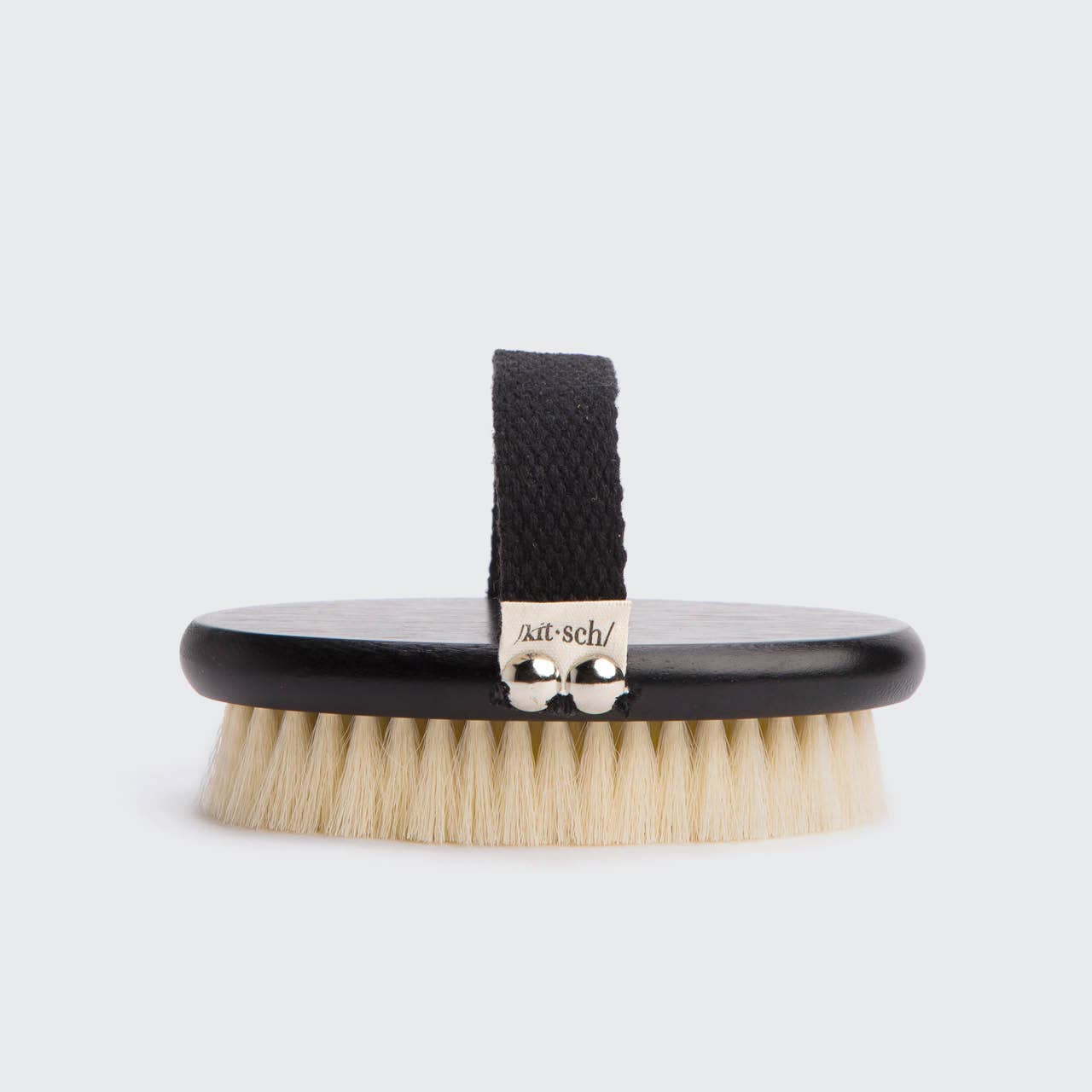 KITSCH exfoliating body dry brush with wooden handle and natural bristles for skin exfoliation and smoothness.