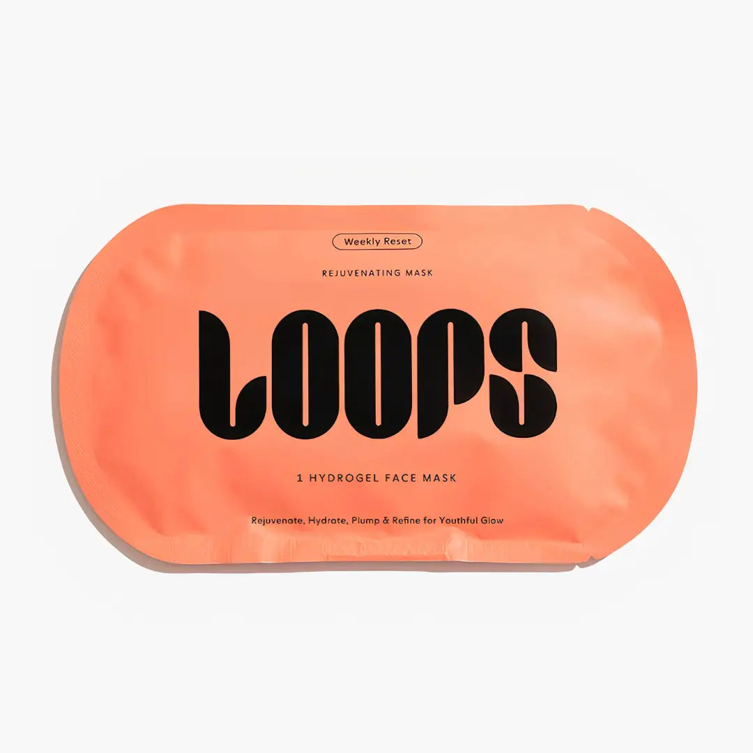 LOOPS Weekly Reset Rejuvenating Single Sheet Mask applied on face, showcasing its hydrating and revitalizing skincare benefits.