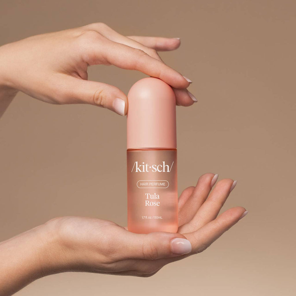 KITSCH Tula Rose Hair Perfume bottle with floral label and pink cap, designed for refreshing and scenting hair.