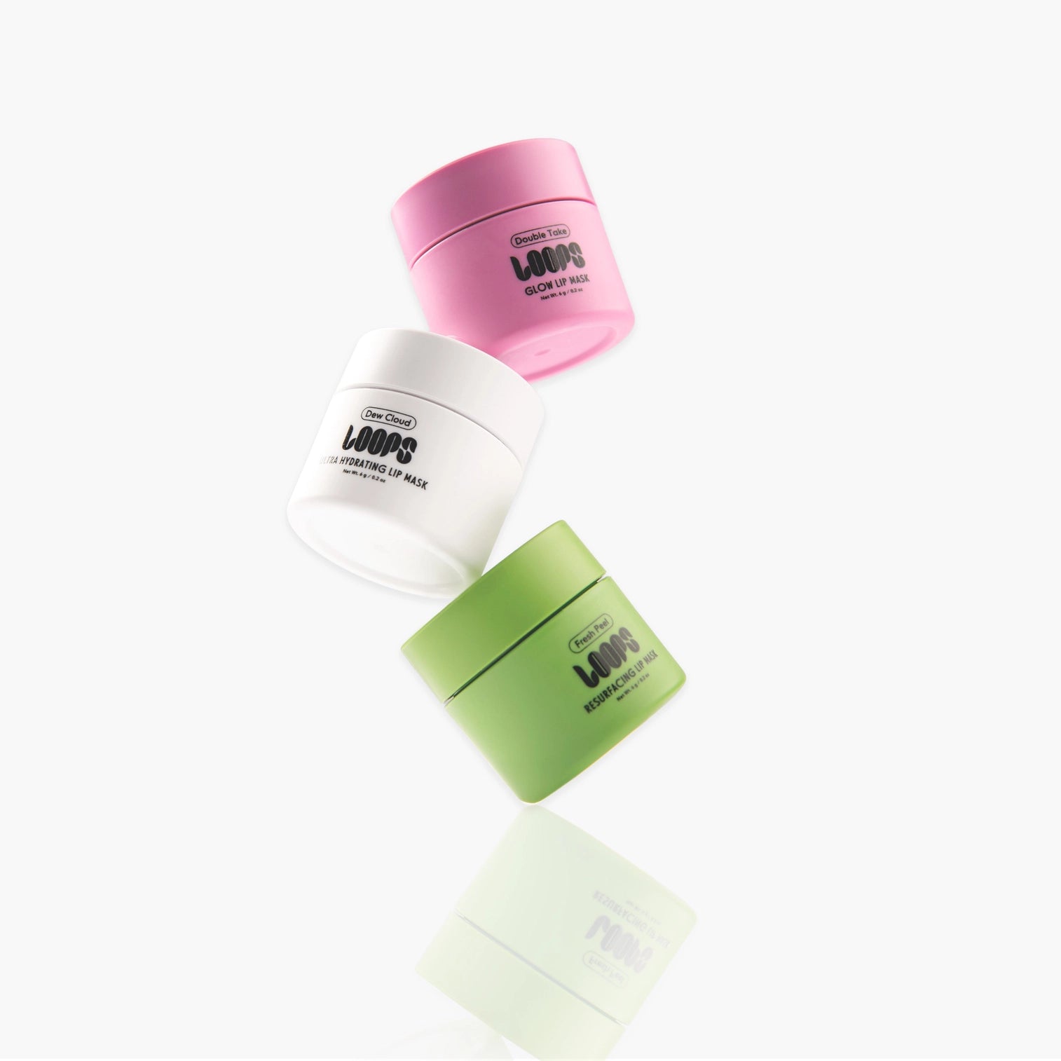 LOOPS Double Take Mini Lip Mask in sleek container, featuring nourishing lip treatment with vibrant packaging and product branding.