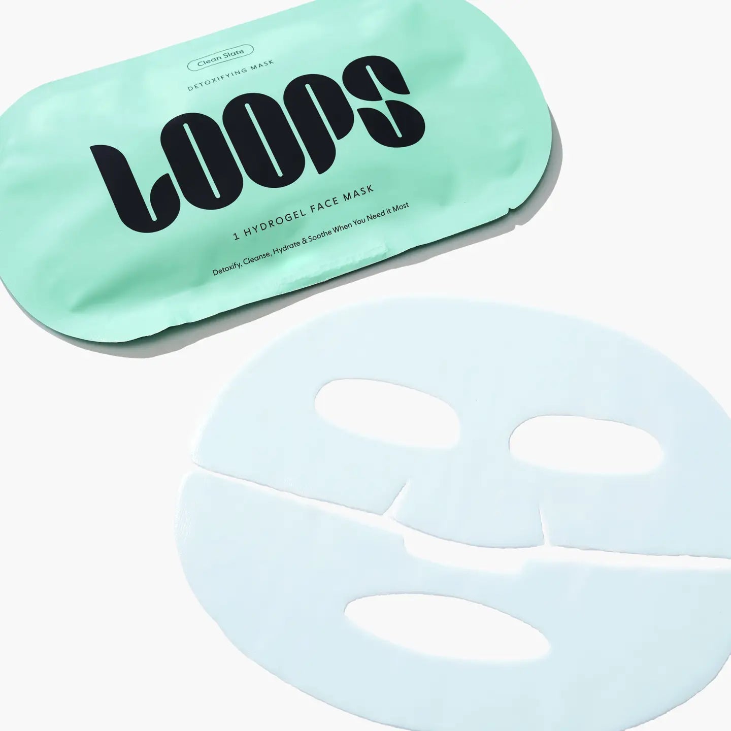 LOOPS Clean Slate Detoxify single sheet mask with natural ingredients, shown unfolded on a white background.