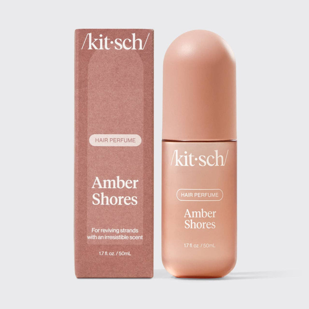 KITSCH Amber Shores Hair Perfume bottle with amber-colored liquid and label, showcasing elegant packaging and design.