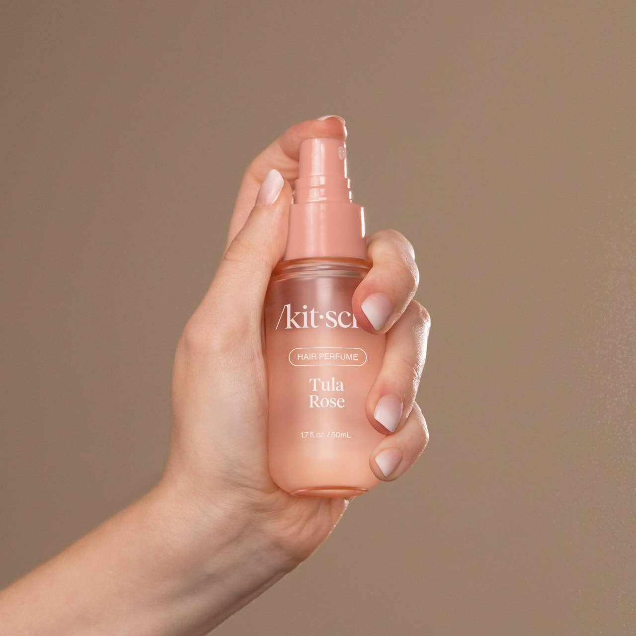 KITSCH Tula Rose Hair Perfume bottle with floral design, showcasing the elegant packaging and product label.
