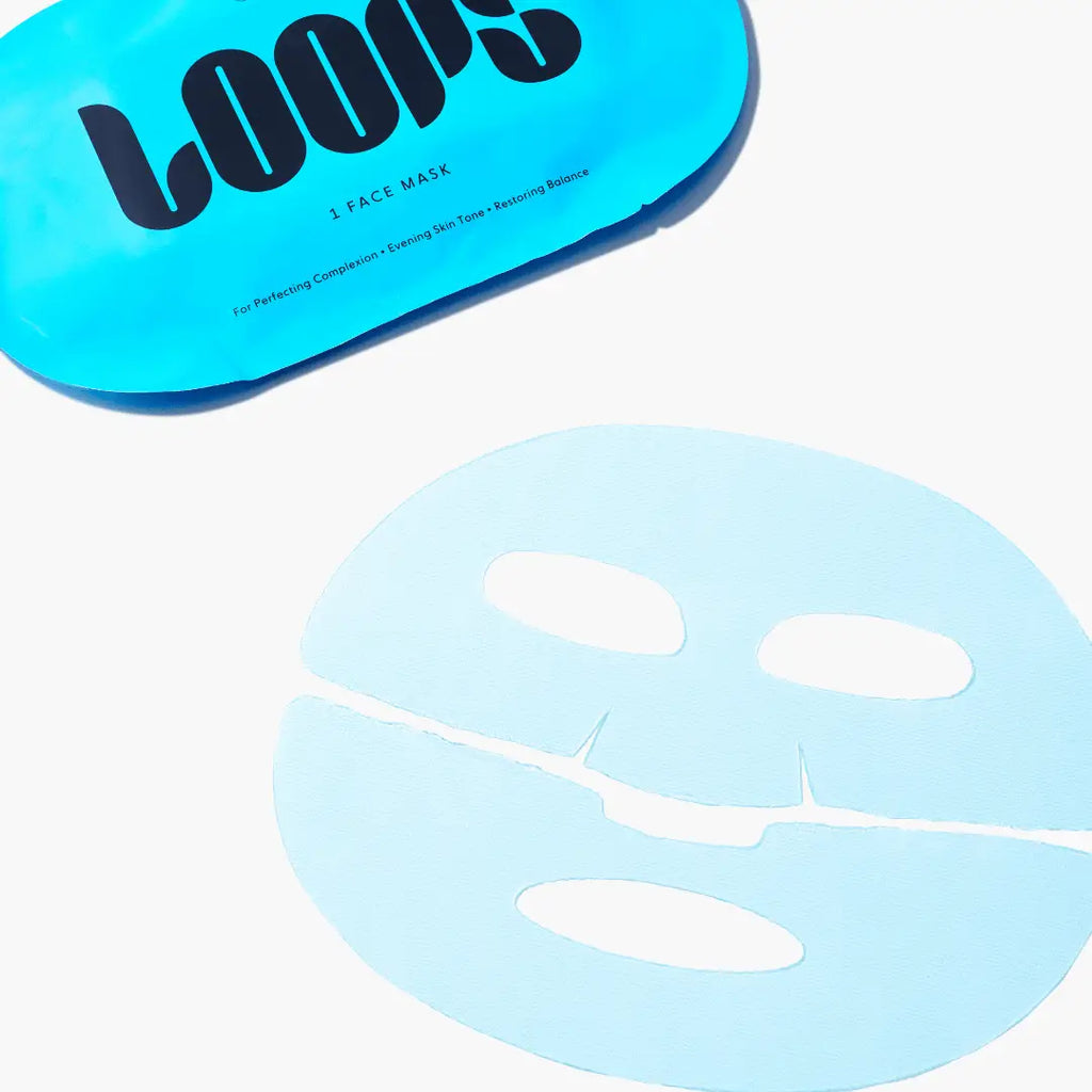 LOOPS Weekly Reset Dark Spot Single Sheet Mask showing a folded white sheet mask on a neutral background
