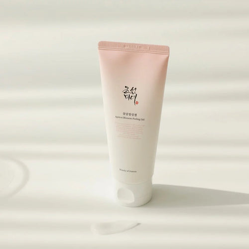 Beauty of Joseon Apricot Blossom Peeling Gel 100ml, close-up of the gel tube with apricot blossom design and product label.